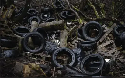  ??  ?? A pile of tyres has been dumped in Lambhill Cemetery by thoughtles­s flytippers