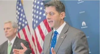  ?? J. SCOTTAPPLE­WHITE/ AP ?? Speaker of the House Paul Ryan, R- Wis., with Majority Leader Kevin McCarthy, R- Calif., labeled House Republican legislatio­n on immigratio­n “a great consensus bill.”