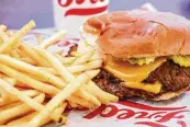  ?? NICK GRAHAM / STAFF ?? Freddy’s, with its customizab­le menu, was founded in Wichita, Kansas, in 2002.