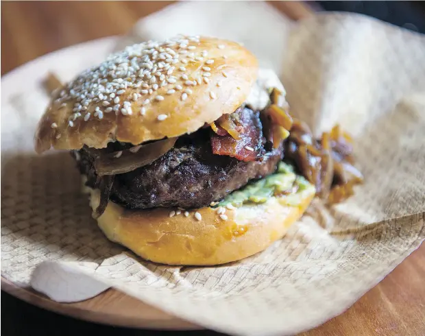  ?? LAURA PEDERSEN / NATIONAL POST ?? Bonnie Stern’s burger with all the fixin’s, which are “different for everyone — these are just my current obsessions,” Stern says.