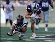  ?? CHARLIE RIEDEL — THE ASSOCIATED PRESS, ?? Kansas State tight end Ben Sinnott, No. 34, is chased by Southeast Missouri State defensive back Lawrence Johnson, No. 7, during the first half of an NCAA college football game against Southeast Missouri State, Sept. 2, 2023.