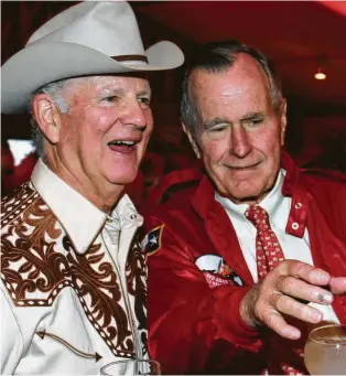  ?? Gary Fountain / Contributo­r ?? Former Secretary of State James A. Baker III, left, with former President George H.W. Bush at Baker’s 75th birthday party in 2005. Baker said the Bush patriarch spent his final moments with family and music. “Everything about it was quite emotional, but it was sweet,” Baker said.