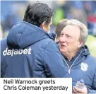  ??  ?? Neil Warnock greets Chris Coleman yesterday