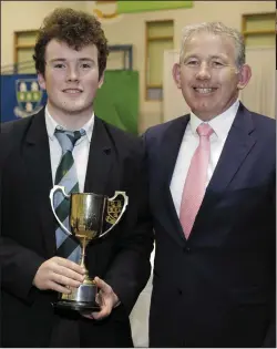 ??  ?? Sportspers­on of the Year Liam Noonan with principal Tom Geraghty.