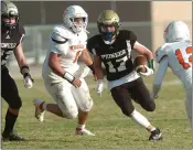  ?? ROGER LONG COURTESY ?? Patriots JV running back Hector Casas rushes for a nice gain during Pioneers game against Woodland back on March 19.