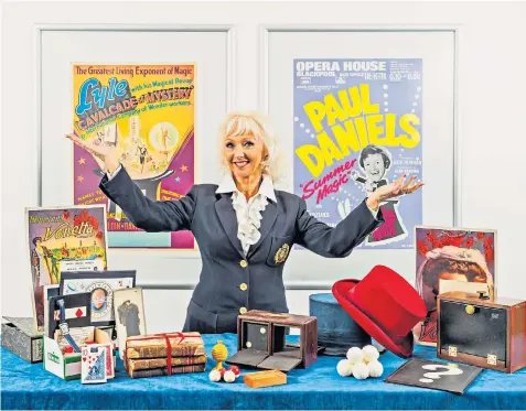  ?? ?? Debbie Mcgee – the widow and former assistant of Paul Daniels, the television magician – is selling off his tricks, costumes and props. They are expected to sell for £200,000