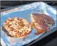  ??  ?? Las Vegas Review-journal A steak and frozen pizza cooked on the dash of a car in the RJ parking lot Tuesday.