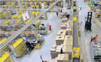  ?? MATTHEW HORWOOD ?? The Amazon Swansea Fulfilment Centre in Jersey Marine is gearing up for Christmas by recruiting another 3,000 staff