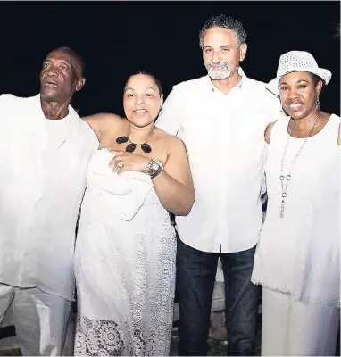  ?? PHOTOS BY JANET SILVERA ?? From left: Lloyd ‘Clive’ Baker, Angela Escoffery, and Michael and Colleen Hall.