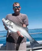  ??  ?? Benjamin Cannings, from Wiltshire, got out boat fishing for the first time since lockdown. Fishing on Silver Spray charters out of Poole, he boated a 10lb 3oz bass.