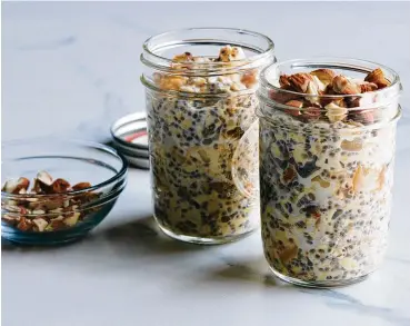  ?? DAVID MALOSH/THE NEW YORK TIMES ?? Genevieve Ko’s overnight oats, a perfect recipe for busy schedules that can include cranberrie­s, raisins, dried blueberrie­s or whatever fruit your picky toddler is currently into, in New York. This is a dish that children will happily eat over and over.