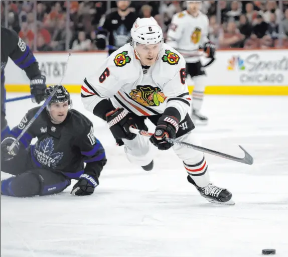  ?? Erin Hooley The Associated Press ?? Defenseman Jake Mccabe was among the bigger names on the move Monday with his trade from Chicago to Toronto.