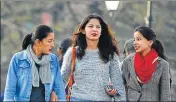  ?? DEEPAK SANSTA /HT ?? Girls take a stroll on The Ridge in Shimla on Tuesday.