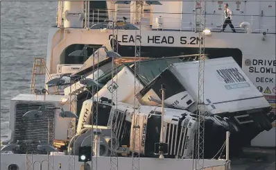  ?? PICTURES: PA WIRE. ?? HEAVY WEATHER: Toppled lorries on board the European Causeway, P&amp;O Ferry, which was battered by high winds