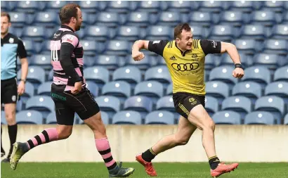  ??  ?? Melrose’s Nyle Godsmark celebrates scoring a late try to make it 23-18