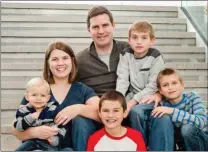  ??  ?? Courtesy photo Katie Evans with her husband, Jacob, and four of their six children before she was killed in an car crash on Oct. 6. Jacob and Katie — now just Jacob — had six children, each with their own character and their own needs. They are...