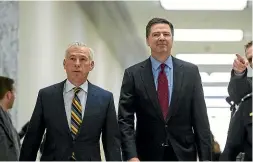  ?? WASHINGTON POST ?? Former FBI director James Comey, centre, has attended a second closed-door interview with House lawmakers.