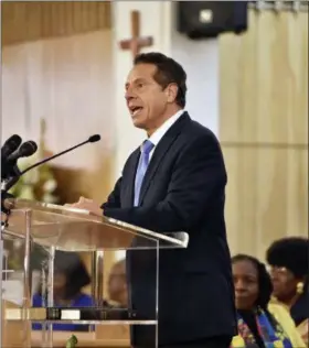  ?? OFFICE OF THE GOVERNOR OF NEW YORK/KEVIN COUGHLIN VIA AP ?? In this photo provided by the Office of the Governor of New York, New York Gov. Andrew Cuomo addresses the congregati­on at the First Baptist Church of Crown Heights in Brooklyn borough of New York, Sunday, Aug. 19, 2018. Cuomo hammered Donald Trump for creating what he called a “frightenin­g portrait” of today’s America. In a searing speech from the pulpit, Cuomo said the president has fooled many people in this country, but the Democrat said the Republican president hasn’t fooled New Yorkers.