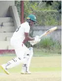  ?? PHOTO BY LENNOX ALDRED ?? Carlos Brown guides a ball toward third man on his way to scoring a century against Manchester in their JCA Senior Cup encounter at Chedwin Park on thge weekend.