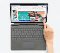  ?? ?? The Signature Keyboard connects to the tablet and provides a lightweigh­t, comfortabl­e typing experience.