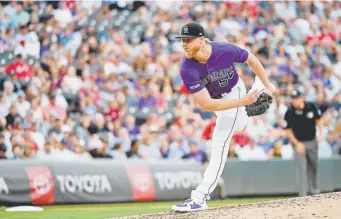  ?? Photos by Joe Amon, The Denver Post ?? Rockies starting pitcher Jon Gray has changed his pregame routine, visualizin­g the mound, the pitching rubber and the catcher’s mitt with his headphones on.