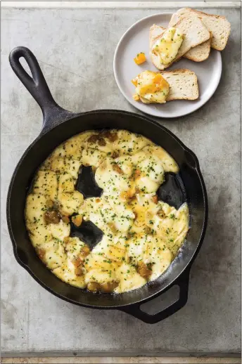  ?? PHOTO COURTESY OF AMERICA’S TEST KITCHEN ?? Baked Brie with Honeyed Apricots (recipe in column) With the cheese warmed, it magically transforms into a rich, dippable medley