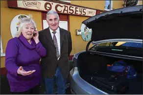  ??  ?? Trunk call: Anne Casey with taxi driver Martin Bermingham yesterday