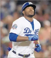 ?? Allen J. Schaben Los Angeles Times ?? YASIEL PUIG shed most of his uniform for a photo spread that will appear this week in ESPN the Magazine’s body issue.