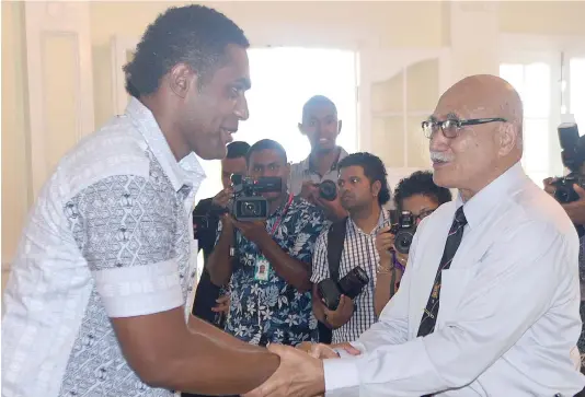  ?? Photo: Ronald Kumar ?? Vodafone Flying Fijians squad member Viliame Mata meets the President Major-General (Ret’d) Jioji Konrote at the State House on June 2, 2017.