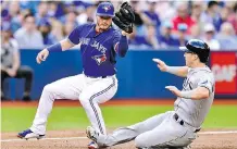  ?? FRANK GUNN/THE CANADIAN PRESS ?? MLB Network’s Jon Heyman reports five teams have shown interest in third baseman Josh Donaldson, although the Blue Jays don’t seem to be interested in trading him right now.