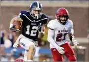  ?? Steven Eckhoff / Rome News-Tribune ?? Berry’s Mason Kinsey (12) makes his way to the end zone after catching a pass against Rhodes on Saturday.