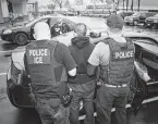  ?? Associated Press file photo ?? In President Joe Biden’s first month in office, the number of ICE arrests dropped more than 60 percent.