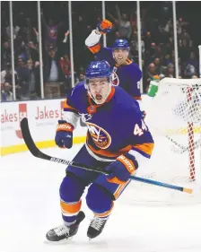  ?? BRUCE BENNETT/GETTY IMAGES ?? Jean-gabriel Pageau scores for his new team, the New York Islanders, on Tuesday night against the New York Rangers. Michael Traikos says the Senators shouldn’t have traded Pageau.