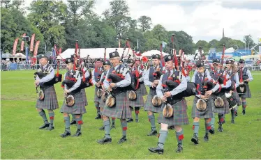  ??  ?? Music Perth and District Pipe Band entertain the crowd