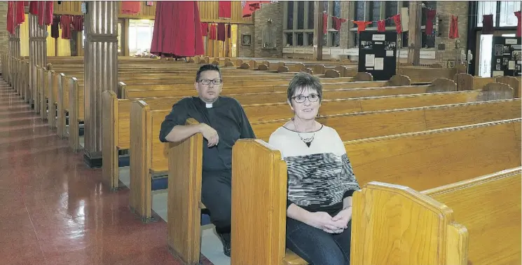  ?? LARRY WONG/EDMONTON JOURNAL ?? Rev. Travis Enright and Lay Canon Barbara Burrows sit in All Saints’ Anglican Cathedral in Edmonton, where a Truth and Reconcilia­tion exhibit on residentia­l schools opens on Tuesday. Running until Nov. 11, the exhibit covers 262 years of the...