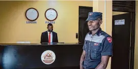  ?? /Associated Press ?? A security guard stands in the reception area of the Hope Hostel, which is one of the locations expected to house some of the asylum-seekers due to be sent from Britain to Rwanda, in the capital Kigali, Rwanda, on June 10, 2022.