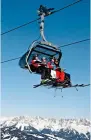 ??  ?? HIgH flIErS: A busy ski-lift in Kirchberg