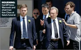  ??  ?? MOURNING: Cardiff boss Warnock and chairman Ken Choo at Sala’s funeral