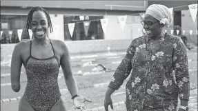  ?? AFP ?? Top: Swimming coach Joachim Sserwada (right) directs a training session with members of the Gators swim club, led by Husnah Kukundakwe, who is currently Uganda’s only Paralympic­s classified swimmer. Middle: Husnah trains together with other members of the club. Above: Husnah enjoys a joke with her mother and manager Hashima Patience Batamuriza.