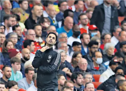  ??  ?? Under pressure: Mikel Arteta watches his side struggle, while Pierre-emerick Aubameyang (right) came off the bench