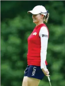  ?? BUTCH DILL — THE ASSOCIATED PRESS ?? Sarah Jane Smith smiles as she walks up to the fifth green during the second round of the U.S. Women’s Open at Shoal Creek, Friday in Birmingham, Ala.