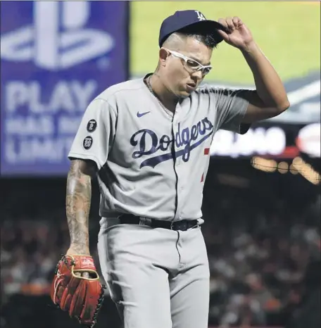  ?? Wally Skalij Los Angeles Times ?? JULIO URÍAS was finally free from innings restrictio­ns in 2021 and he responded with 20 wins. Now, he’ll try to save the Dodgers’ season.