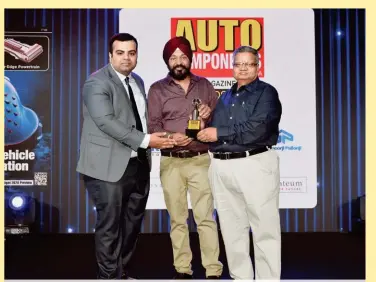  ??  ?? Hardeep Singh Suri, Assistant Manager, Sales, Jamna Auto Industries Ltd. (middle) and Satish Sharma, Zonal Sales Manager-West, Jamna Auto Industries Ltd. (first from right) receiving the Award for Technologi­cal Excellence from Ashish Bhatia, Executive Editor, Auto Components India (first from left) at ACI Awards 2020.