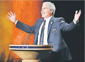  ??  ?? HUMBLING EXPERIENCE: Golfer Fred Couples speaks during his induction into the World Golf Hall of Fame at the World Golf Village in St Augustine, Florida. — AFP photo