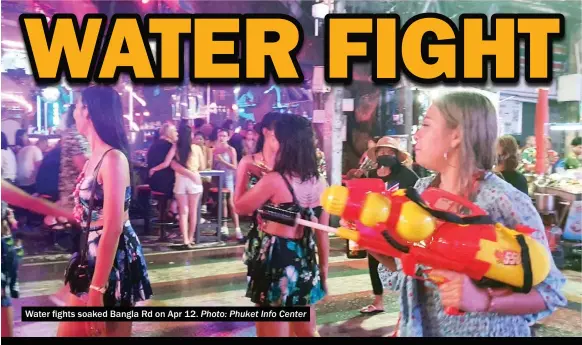  ?? Photo: Phuket Info Center ?? Water fights soaked Bangla Rd on Apr 12.