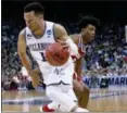  ?? KEITH SRAKOCIC — THE ASSOCIATED PRESS ?? Villanova’s Jalen Brunson (1) drives past Alabama’s Collin Sexton during the second half of a second-round game in the NCAA men’s college basketball tournament, Saturday in Pittsburgh. Alabama won 81-58.