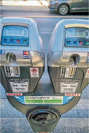  ??  ?? thinking of going on a driving holiday in canada? Some street parking meters in Vancouver are equipped with credit card payment options. — Wikimedia commons