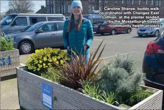  ?? ?? Caroline Sharpe, buddy walk co-ordinator with Changes East Lothian, at the planter tended by the Musselburg­h-based community health project