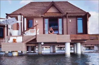  ?? STEVE MacNAULL/The Okanagan Weekend ?? Sandals South Coast has only 12 exclusive over-the-water bungalows built off a heart-shaped dock.