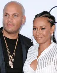  ??  ?? Split: Mel B and producer Stephen Belafonte